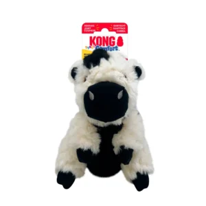 Juguete para perro KONG Tyke Comfort con forma de vaca de peluche suave y sonido, con embalaje visible.