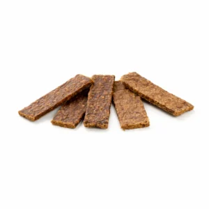 Filetes de caballo deshidratado para perros de la marca Kauartikel, snack natural hipoalergénico rico en proteínas.