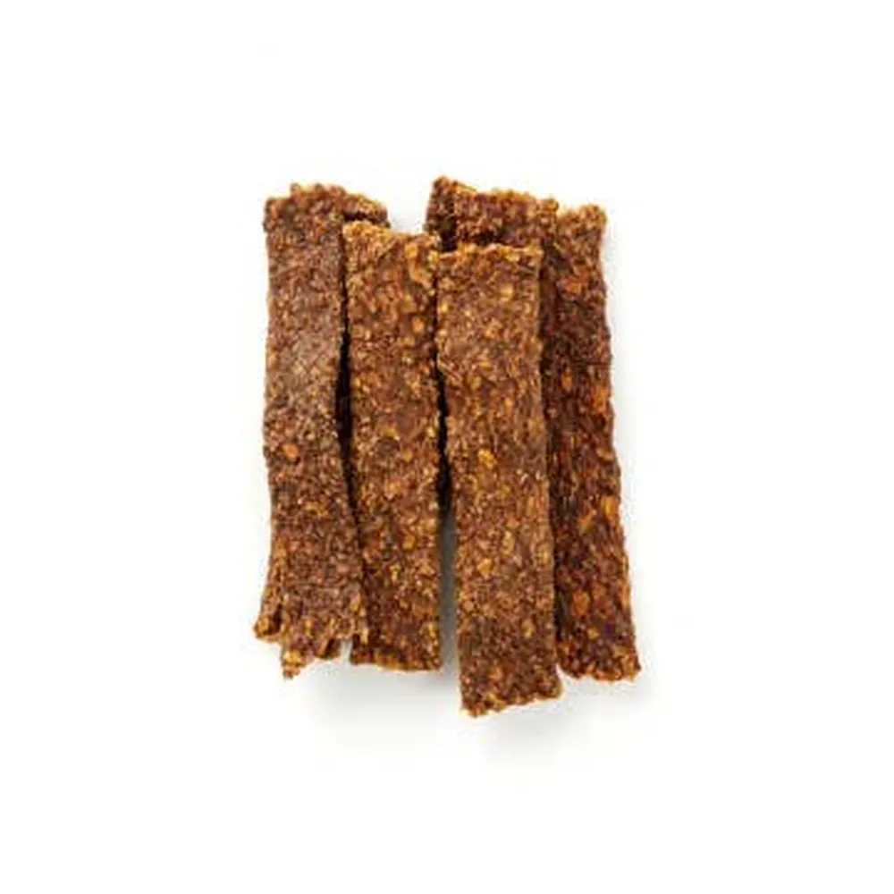 Filetes naturales de conejo deshidratado para perros de la marca Kauartikel, snack rico en proteínas ideal como premio.