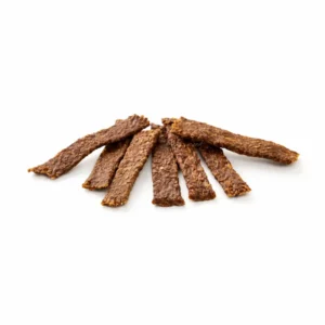 Filetes de conejo deshidratado para perros de la marca Kauartikel, snack natural rico en proteínas ideal como premio.
