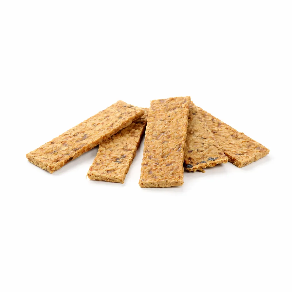 Filetes de pavo deshidratado para perros de la marca Kauartikel, snack natural rico en proteínas ideal como premio.