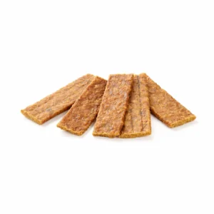 Filetes de pollo deshidratado para perros de la marca Kauartikel, snack natural rico en proteínas ideal como premio.