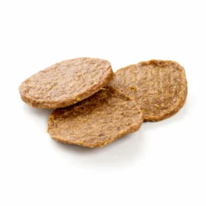 Hamburguesas naturales de pollo deshidratado para perros Kauartikel, snack proteico para premios o entrenamiento canino.